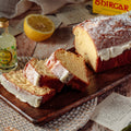 Close-up of lemon cake topped with sweet citrus icing