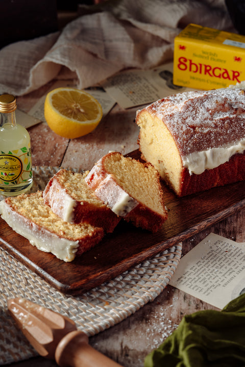 Close-up of lemon cake topped with sweet citrus icing